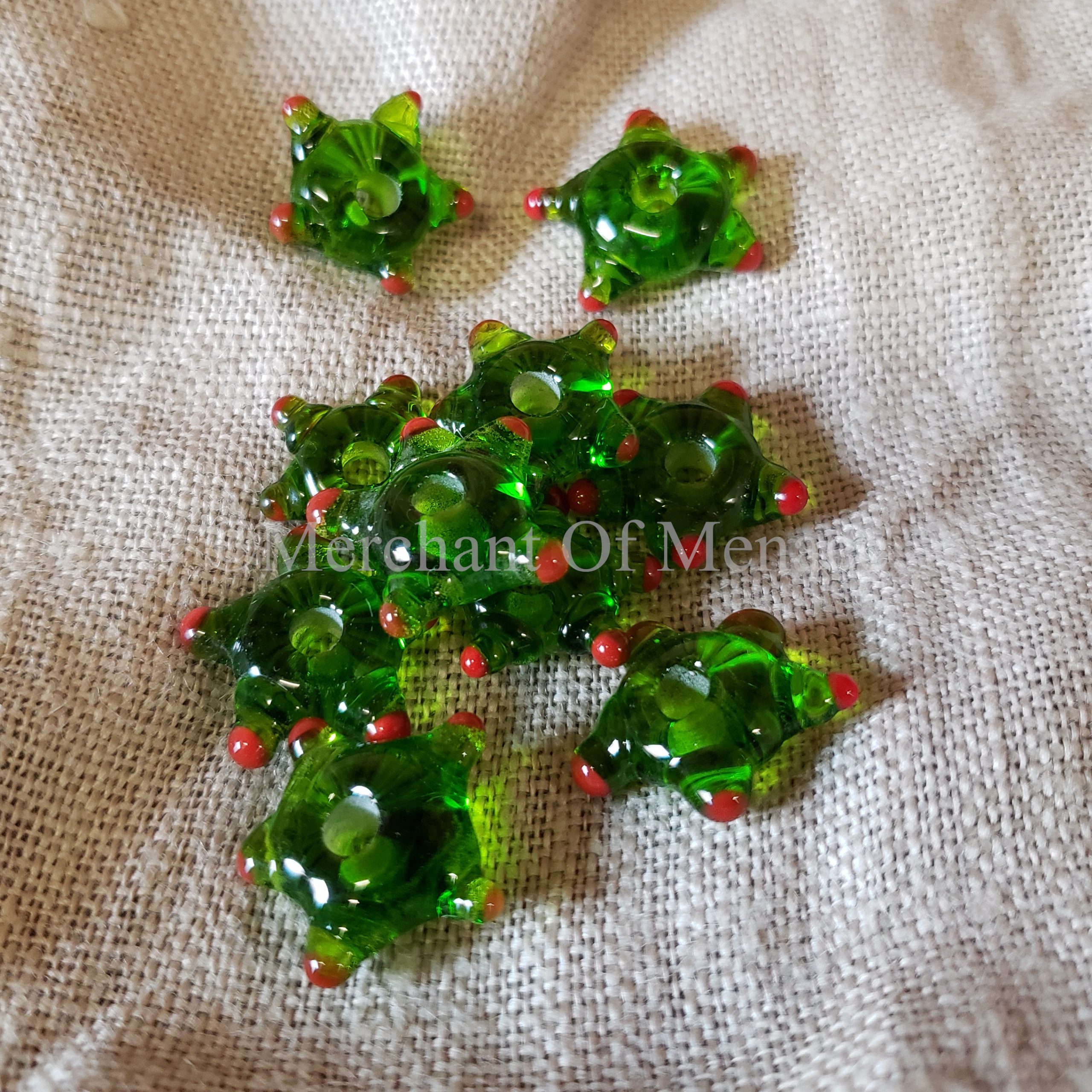 Green 'Turtle' bead 500-800 AD