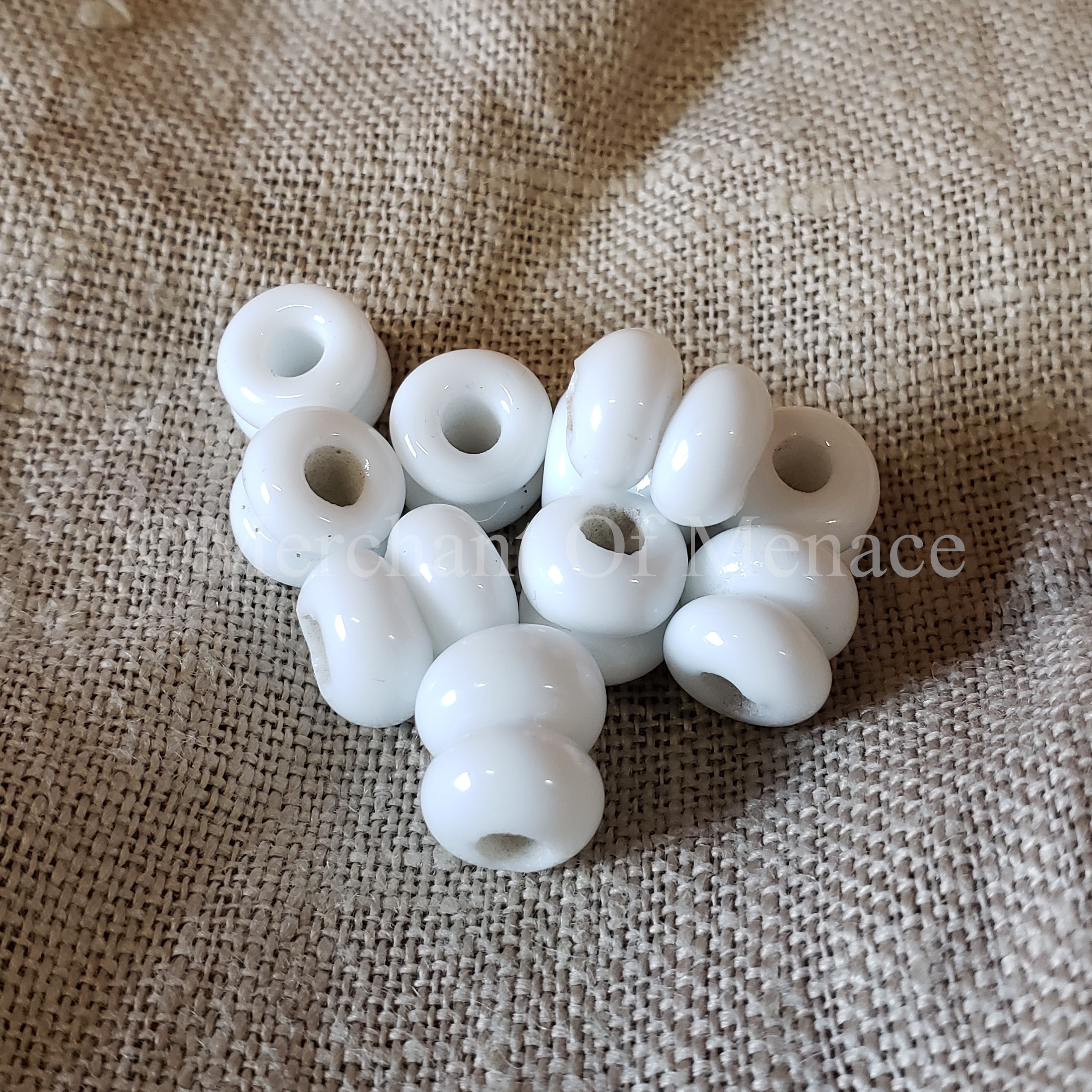 White Two Segment bead 600-850 AD